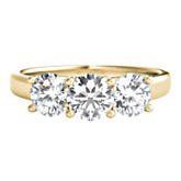 Symbolize your past, present, and future together with this 14K yellow gold ring, which is designed with 1 round brilliant cut center diamond weighing approximately 1/2 ct. tw. and 2 round brilliant cut diamonds weighing approximately 1 ct. tw.